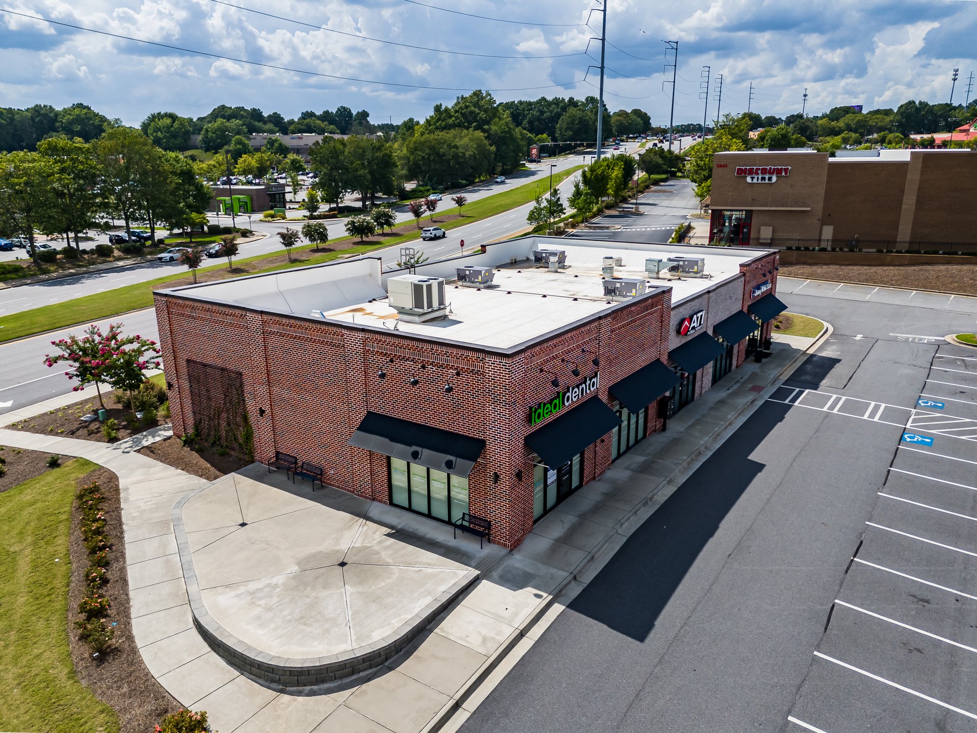 Aerial view of Medlock Corners at 5855 State Bridge Road, Johns Creek — updated 2026 photography